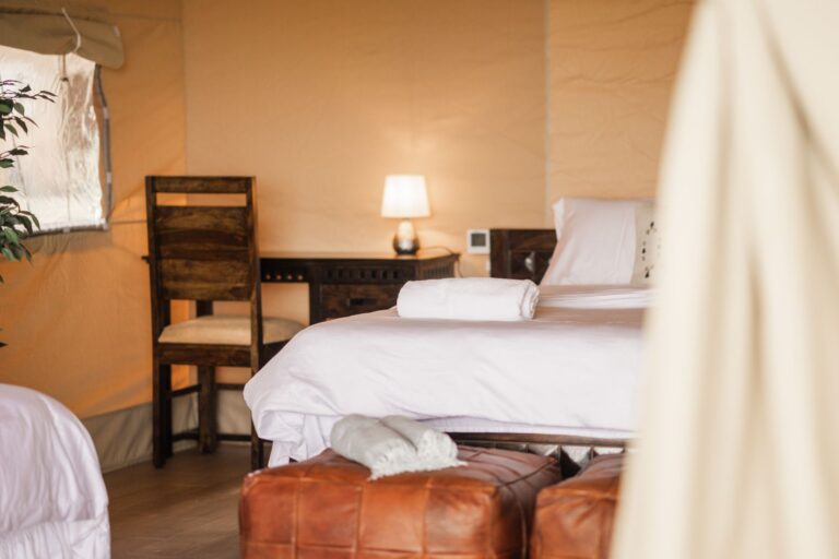 Family glamping tent interior at Mia Glamping in Saaremaa with bed and seating area